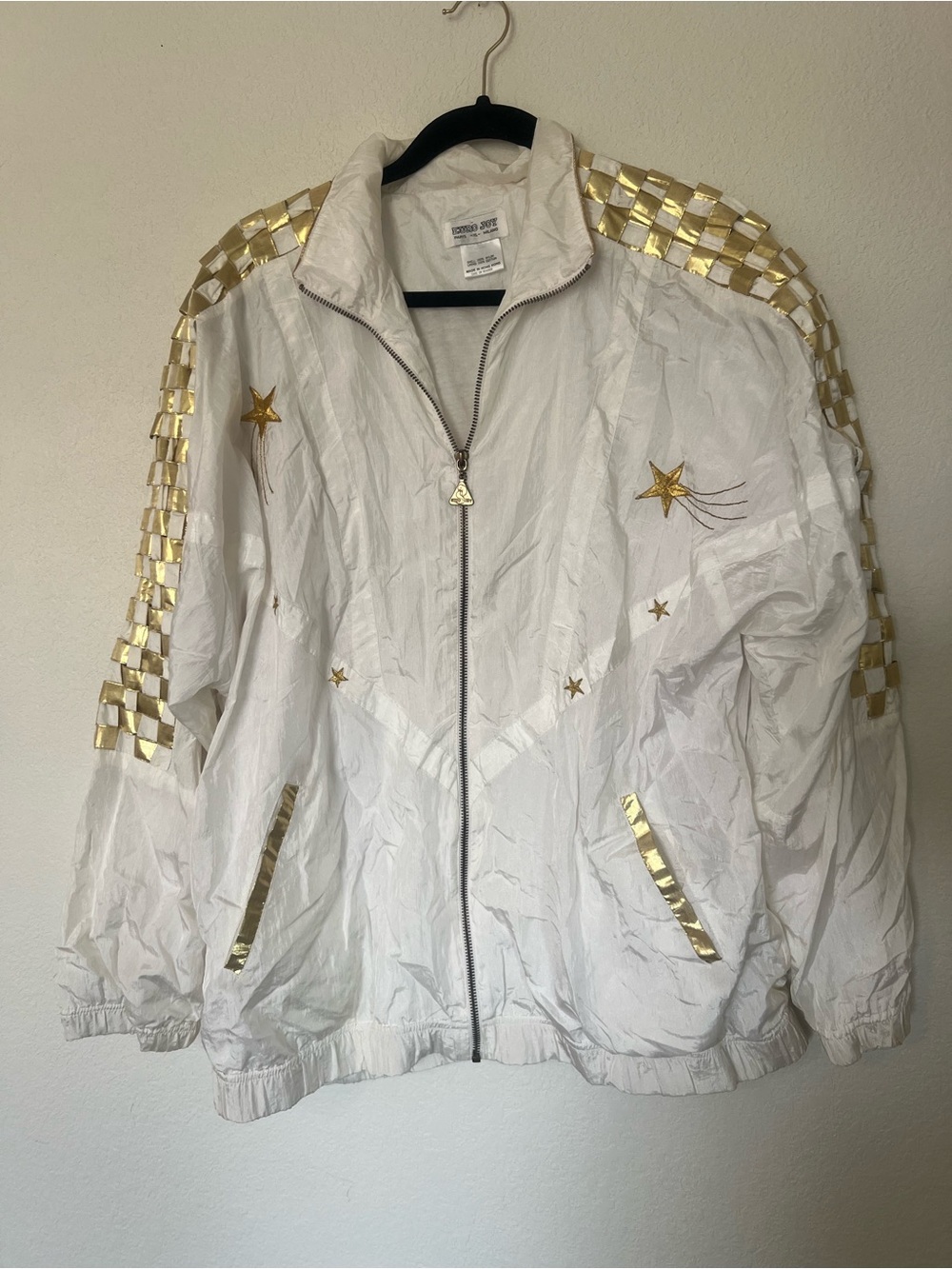 White Bomber Jacket with Gold Star Embellishments